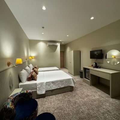 Deluxe Triple Room Dove Hotel&Suites Promo Code