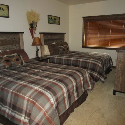 Queen Room with Kitchen Townhomes on The Green Promo Code