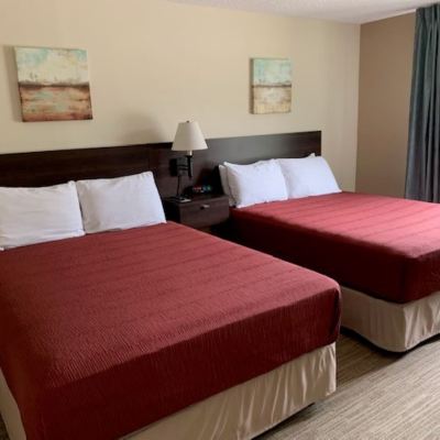 Deluxe Suite with 2 Queen Beds McCoy's Inn Promo Code
