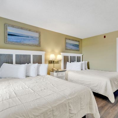 Oceanfront 1 Bedroom Suite with Balcony and Full Kitchen Windsurfer Hotel Promo Code