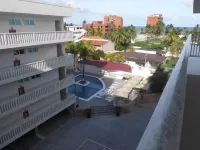 Tucacas Beach Hotel Отели в г. 