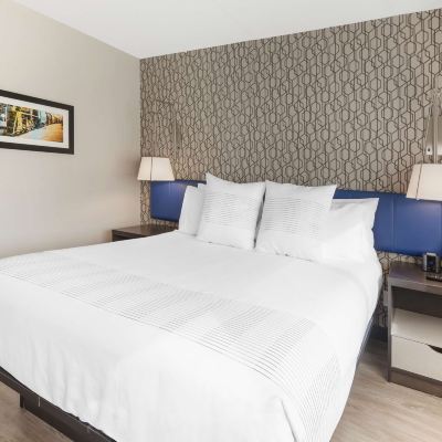 Suite-1 King Bed, Non-Smoking, Separate Bedroom, Sofabed, Microwave and Refrigerator, Keurig Coffee Maker, Walk in Shower GLō Best Western Mississauga Corporate Centre Promo Code
