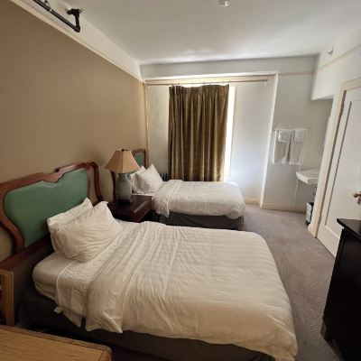 Basic Room, 2 Twin Beds, Shared Bathroom Nash Hotel Promo Code