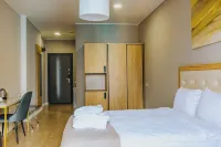 Komunna Luxe Hotel a 
