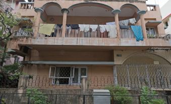 a large apartment building with laundry hanging on the balconies and clothes hanging to dry at Radical