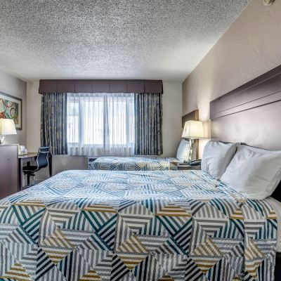 Standard Room with One Queen Bed and One Single Bed-Non-Smoking Eastside Lodge Promo Code