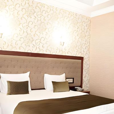 Deluxe Quadruple Room Capitol Hotel Promo Code
