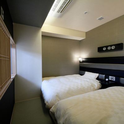 デラックス ツインルーム ホテル道後やや クーポン