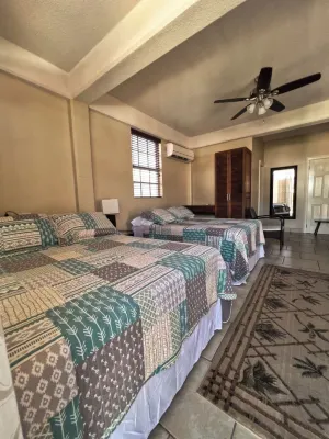 Timbo's Apartelle Hotéis em 