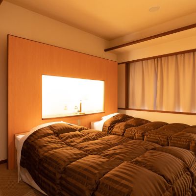 セミウェスタンスタイルルーム 6畳 + ツインベッド 大江戸温泉物語　会津東山温泉　東山グランドホテル クーポン