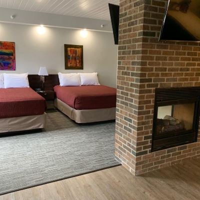 Exclusive Suite, Multiple Beds, Fireplace McCoy's Inn Promo Code