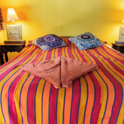 Deluxe Triple Room, Multiple Beds, Patio La Iguana Perdida - Hostel Promo Code