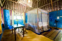Distant Relatives Ecolodge & Backpackers Hotel a 
