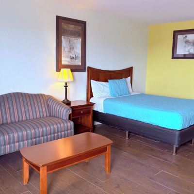 Queen Room - Non-Smoking Champions Inn Promo Code
