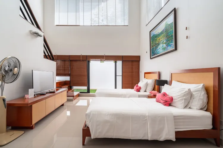 ห้องดูเพล็กซ์ทวินพร้อมลานระเบียง - วิวสวน