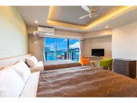 Yenns Marina Inn Mercy Hotele w: Ginowan