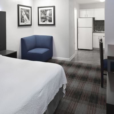 Queen Studio Luxbury Inn & Suites Promo Code