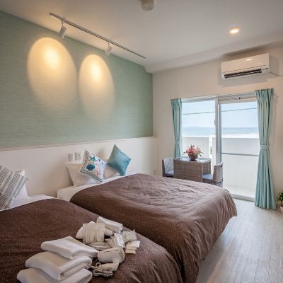 ハリウッドデラックススタンダードオーシャンビューツインルーム(ご利用人数4名)(禁煙) かりゆしコンドミニアムリゾート与那原 SUNRIZE・OCEAN クーポン