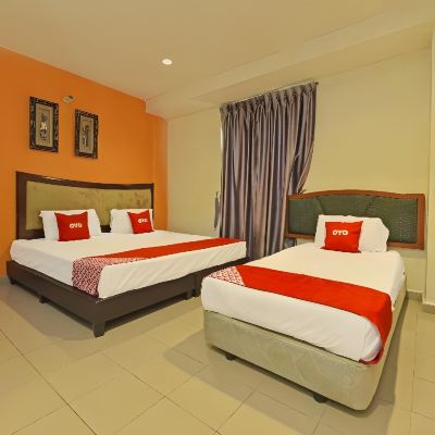Standard Triple Room Kupon OYO 90510 Hotel Sahara
