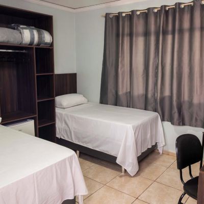 Quarto Com 02 Camas De Solteiro Com Ar Rosa's Hotel Promo Code