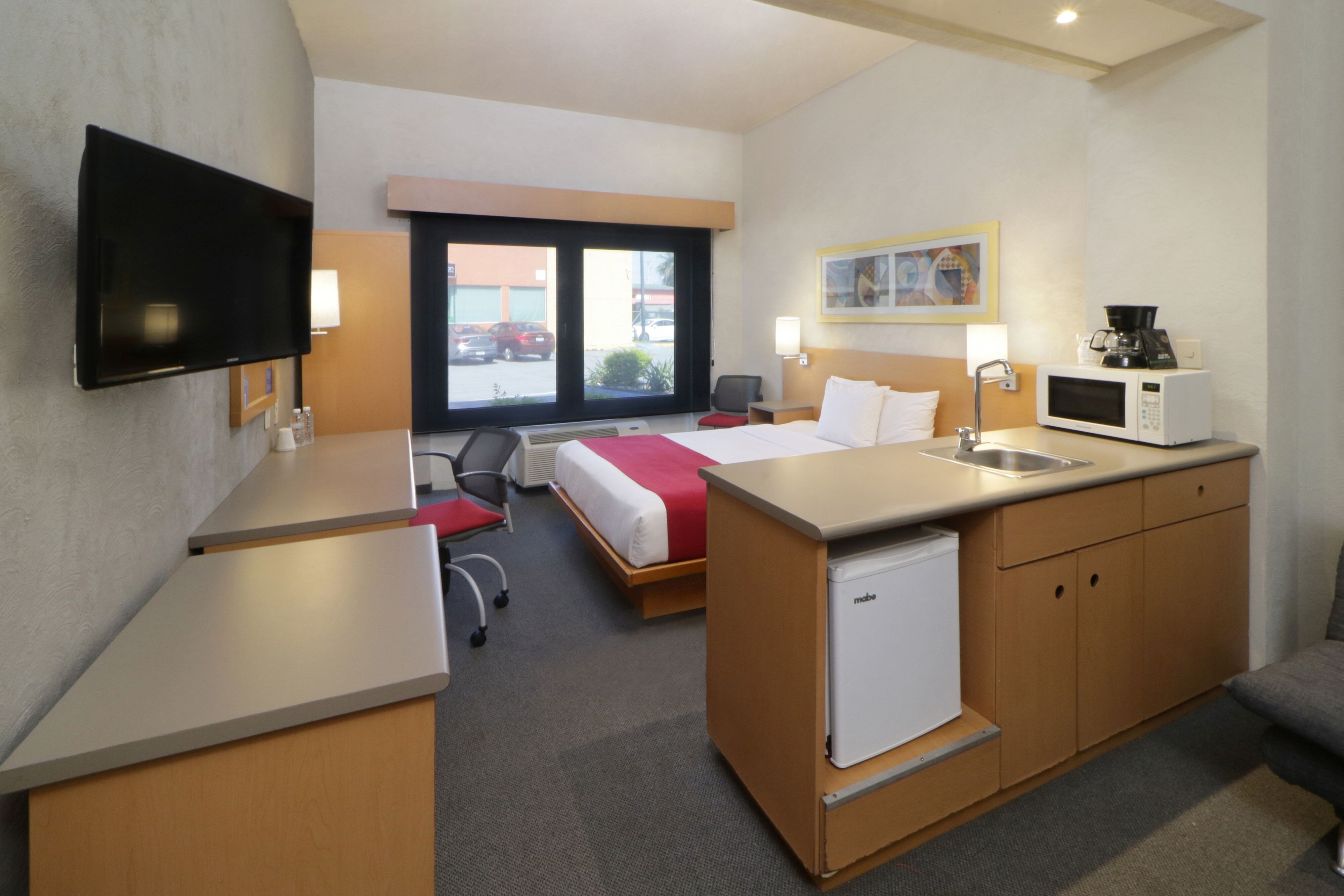 带有梳化床的高级大床房