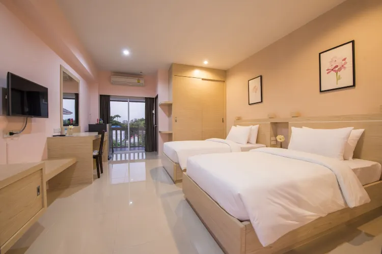 ห้องมาตรฐานเตียงแฝดพร้อมวิวสวนหย่อม