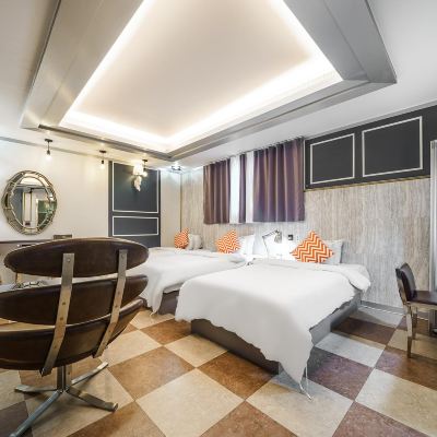 Three Beds No Smoking(No Smoking Room+2 People+Air Purifier+Busines Pc+Styler+Netflix) 넘버25호텔 공주신관점 쿠폰