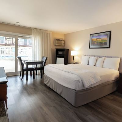 Signature Room, 1 King Bed Ground Floor, Patio (1 King Bed Nonsmoking) King Frederik Inn Promo Code