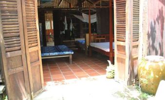 Peaceful Homestay in the Middle of Fruit Garden - Room with Four Double Beds