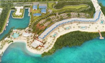 a bird 's eye view of a beachfront resort with multiple buildings , pools , and water at Isla Bella Beach Resort & Spa - Florida Keys