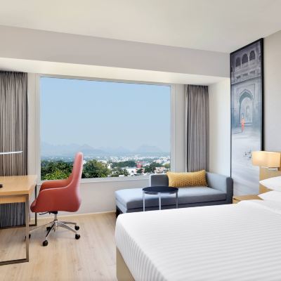 Deluxe King Room with Balcony Courtyard by Marriott Nashik Promo Code