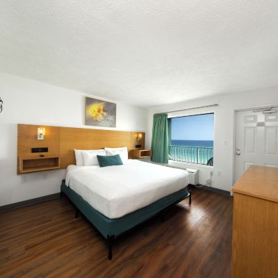 Classic Room, 1 King Bed, Beachfront (Ocean/Gulf View) Beachcomber by The Sea Promo Code