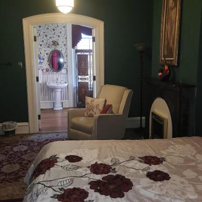 Deluxe Room, 1 King Bed, Non Smoking, Ground Floor (Room 1) Greystone Manor Victorian Inn Promo Code