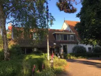 Hotel de Torenhoeve Отели в г. 