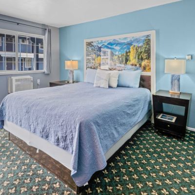 Standard Queen Room Bluebird Day Inn & Suites Promo Code