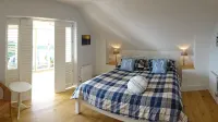 Beach Front Holiday Home on Private Estate with Sea Views.   100+  Reviews!