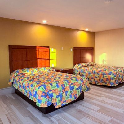 Room With Three Double Beds-Non-Smoking Aloha Inn Promo Code