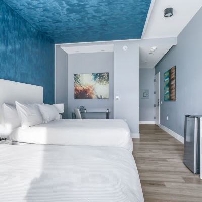 Deluxe Double Room – 2 Queen Beds Global Luxury Suites at The Arches Promo Code