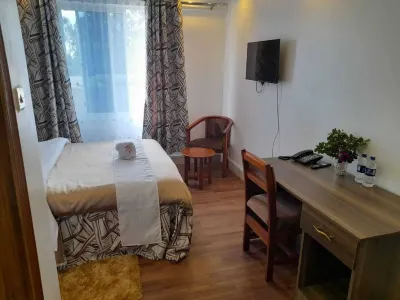 Hellenis Guest House Отели в г. 