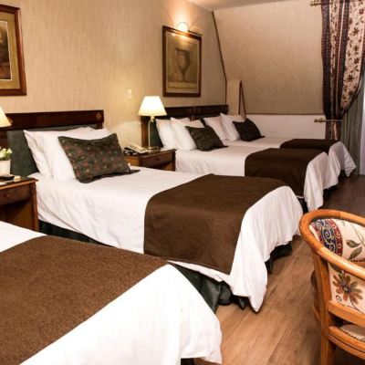 Quadruple Room Mayflower Suites Promo Code