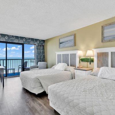 Oceanfront Guest Room with Two Queen Beds, Balcony and Kitchen Windsurfer Hotel Promo Code