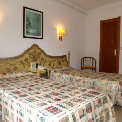 Quadruple Room (2 Adults + 2 Children) Hotel Hostal del Sol Promo Code
