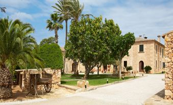 Hotel Rural Es Riquers - Housity