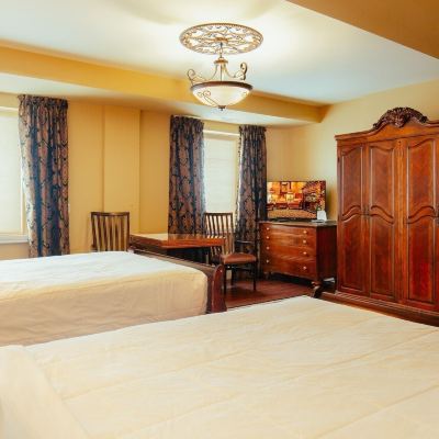 Classic Double Queen Guest Room Grant Hall Hotel Promo Code