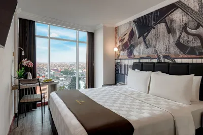 Goldvitel Hotel Surabaya Отели в г. 