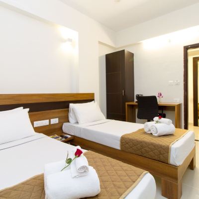 Deluxe Twin Room, 2 Twin Beds Sanctum Suites Whitefield Bangalore Promo Code