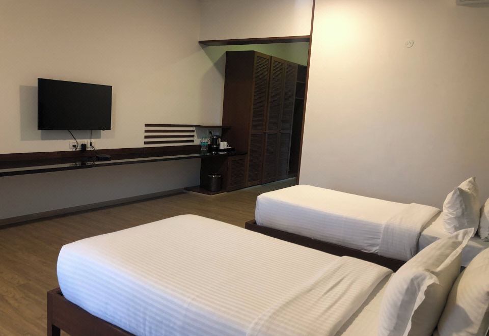 俱乐部双床房， 2 张单人床