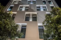 Urban Nest - Suites & Apartments Отели в г. 