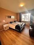 Hlíðarból Guesthouse Hotele w: 