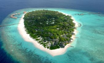 a bird 's eye view of a small island surrounded by clear blue water and white sandy beaches at Adaaran Select Meedhupparu - with 24Hrs Premium All Inclusive